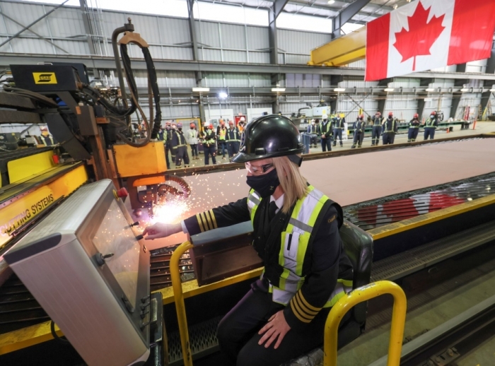 The Canadian Coast Guard’s Heather McDonald cuts the first steel at Seaspan’s Vancouver Shipyard, marking the start of construct